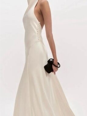 arianwen satin dress Creating weightless volume with The Atelier's signature sculpted tiered tulle Arianwen gown by The Atelier